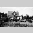 Cars in front of Green Lake house (ddr-densho-134-3)