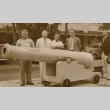 Charles Crane and other men posing with a cannon (ddr-njpa-2-198)