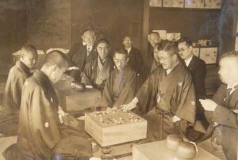 Men playing go while others look on (ddr-njpa-4-74)
