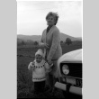 Woman and child in front of car (ddr-densho-1007-1253)