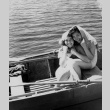 Barbara McElligot and Cherry Ogawa Henmi in a row boat. (ddr-densho-336-82)