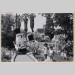 Susan and Leslie Shiomi by miniature golf course (ddr-densho-522-592)