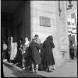 Women standing outside Isetan Department Store entrance (ddr-densho-426-306)