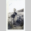 Woman holding flowers (ddr-densho-373-12)