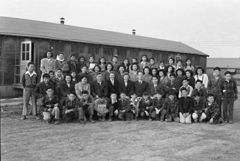 Group photograph in front of barracks (ddr-fom-1-84)