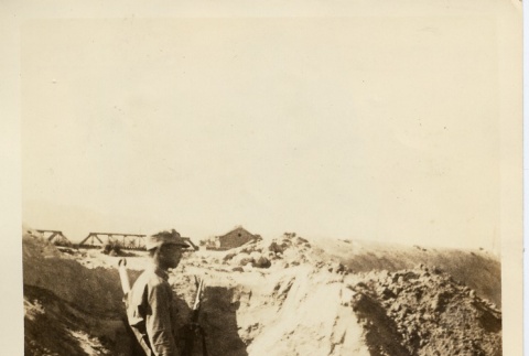 A soldier in a dirt bunker (ddr-njpa-6-111)