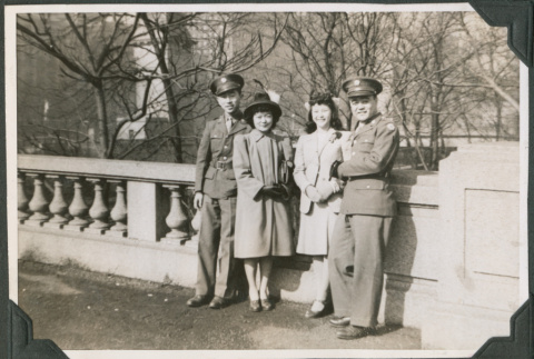 Two woman and two men in uniform.  Joe Iwataki on left (ddr-ajah-2-492)