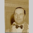 A man wearing leis (ddr-njpa-1-2582)