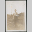 Man standing in field (ddr-densho-359-673)
