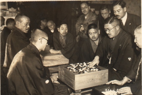 Men playing go while others look on (ddr-njpa-4-73)