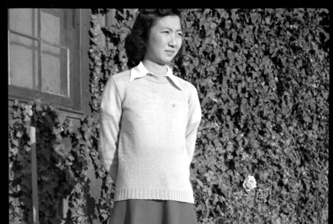 Mae Miwa in sweater and skirt (ddr-densho-475-97)