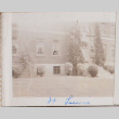 Building with person looking out of window (ddr-densho-464-121)