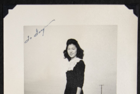 Woman in a dark dress at Rohwer (ddr-densho-542-713)