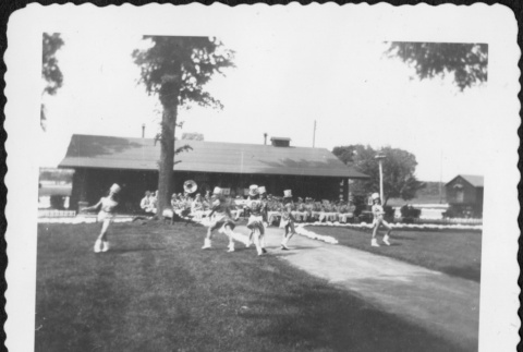 Group of majorettes performing (ddr-densho-434-398)