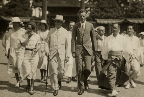 Charles and Anne Lindbergh walking with a crowd (ddr-njpa-1-1187)