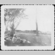 Man in uniform sitting looking at view (ddr-densho-434-414)