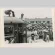 Men climb onto buses (ddr-densho-37-1443)