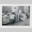 Students cleaning out desks (ddr-densho-37-2133)