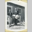 Couple in front of barracks (ddr-manz-4-166)