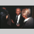 Man with drinks talking (ddr-densho-1007-733)