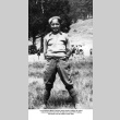 Leroy Kajiwara standing in field (ddr-ajah-6-67)