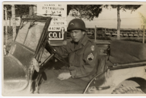 Soldier driving a military vehicle (ddr-densho-451-56)