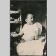 Baby in highchair (ddr-densho-523-64)