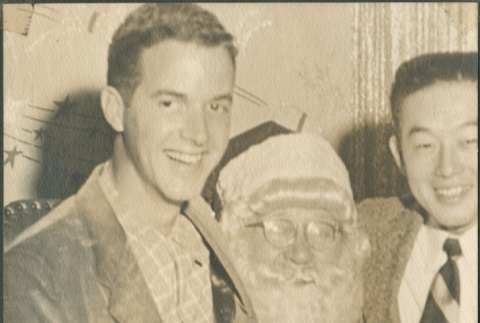 Two men posing with Santa Claus (ddr-densho-321-1071)