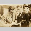 Fred Perry reading an article (ddr-njpa-1-1285)