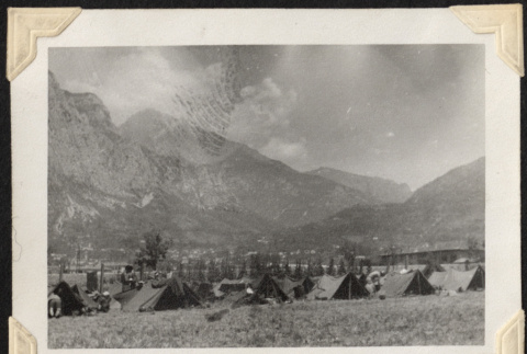 Field with tents and hills in background (ddr-densho-466-646)