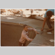 Two men working on pool (ddr-densho-377-1810)
