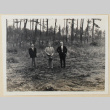Three men standing in a wooded lot (ddr-densho-433-734)