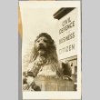 Patriotic sign posted next to one of the Trafalgar Square lions (ddr-njpa-13-283)