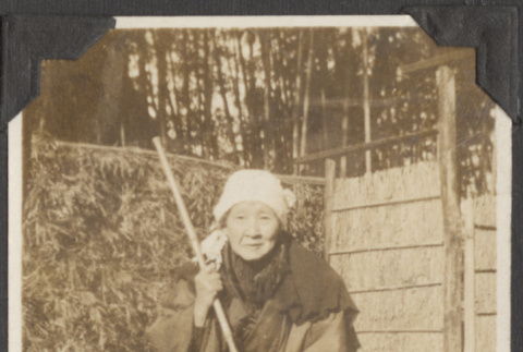 Grandmother sweeping (ddr-densho-432-97)