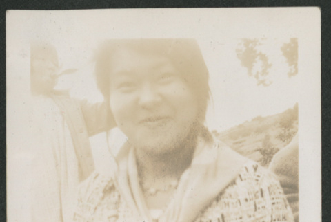 woman holding a box (ddr-densho-378-598)