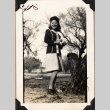 Woman standing by tree (ddr-densho-587-52)