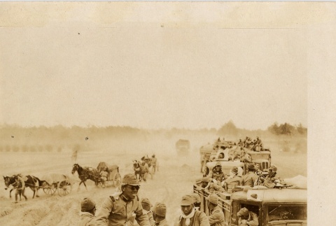 Troops riding in trucks (ddr-njpa-6-103)