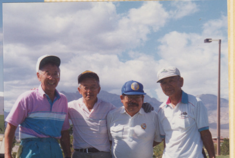 Four men on a golf course (ddr-densho-466-522)