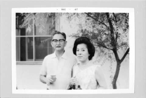Couple in front of house (ddr-densho-1007-468)