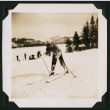 Walter Matsuoka skis down a snowy hill (ddr-densho-390-101)
