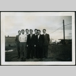 Group of men in an empty lot (ddr-densho-395-89)