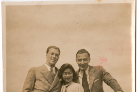 Tomoye Takahashi with two men, standing on deck of ship (ddr-densho-426-1401)
