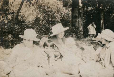 Three ladies and three children sitting in forested area (ddr-densho-348-80)