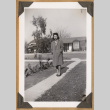 Woman standing on a path (ddr-densho-542-84)