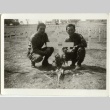 Soldiers beside a military grave (ddr-densho-201-92)