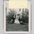 Three women sitting on lawn (ddr-densho-493-110)