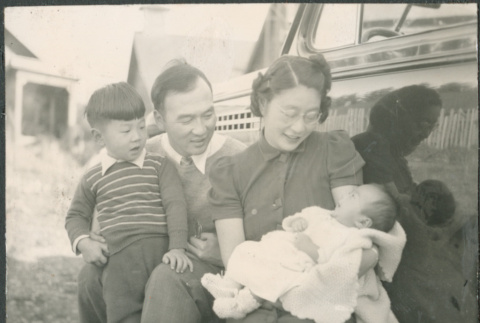 Chester, Agnes and Jon David Sakura with baby Gary (Gerald) Sakura (ddr-densho-523-88)