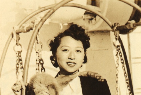Woman posing for a photograph (ddr-njpa-4-2258)