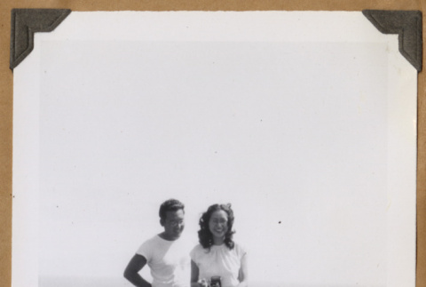 Man and woman on a cliff side (ddr-densho-542-77)