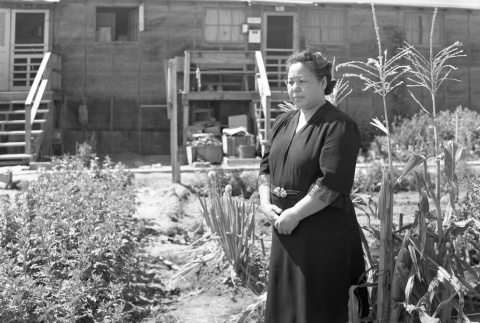 Akino Kinoshita standing in her garden (ddr-fom-1-622)